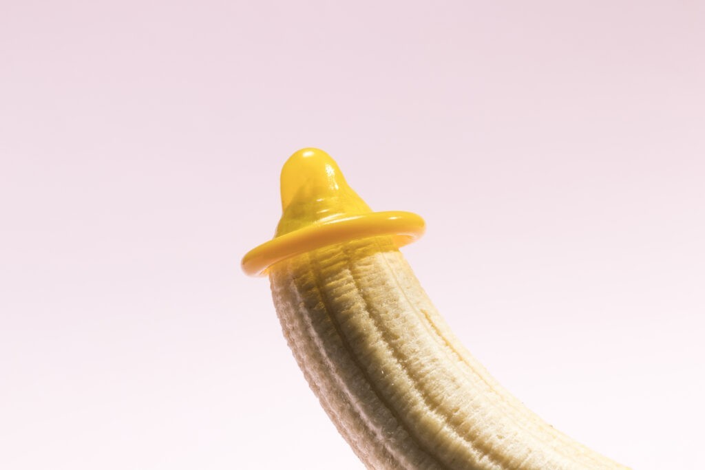 yellow unwrapped condom banana